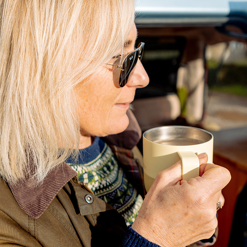 12oz-rise-mug-l5 12oz_rise_coffee_mug_wax_yellow_woman_drink_closeup_square.jpg