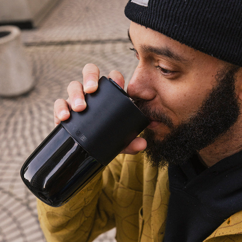 daily-on-the-go-set-b9 16oz_rise_tumbler_black_man_drink_square.jpg