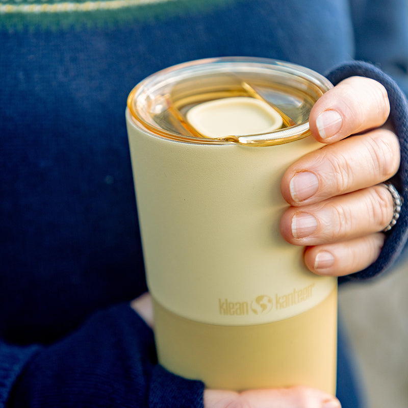 daily-on-the-go-set-b9 16oz_rise_tumbler_wax_yellow_closeup_hand_lid_square.jpg