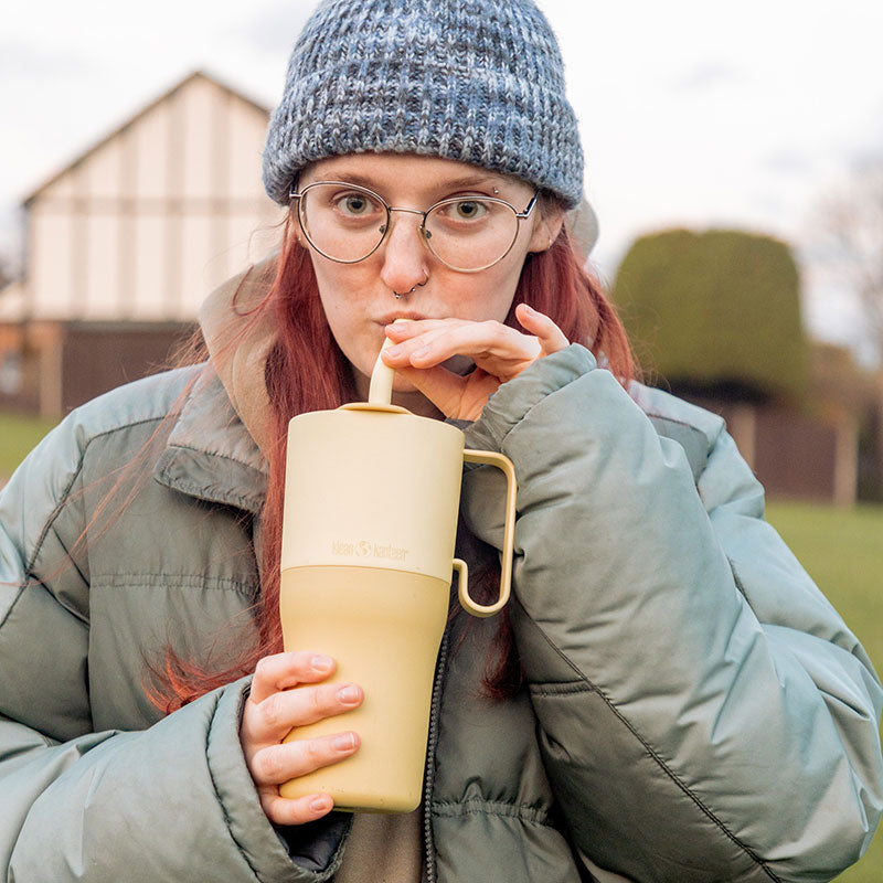 26oz-rise-tumbler-with-straw-lid-i4 26oz_rise_rumbler_straw_wax_yellow_woman_sip_square.jpg