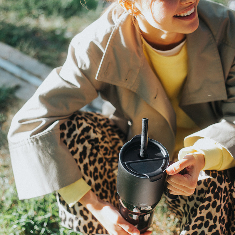 26oz-rise-tumbler-with-straw-lid-i4 26oz_rise_tumbler_black_woman_topview_square.jpg