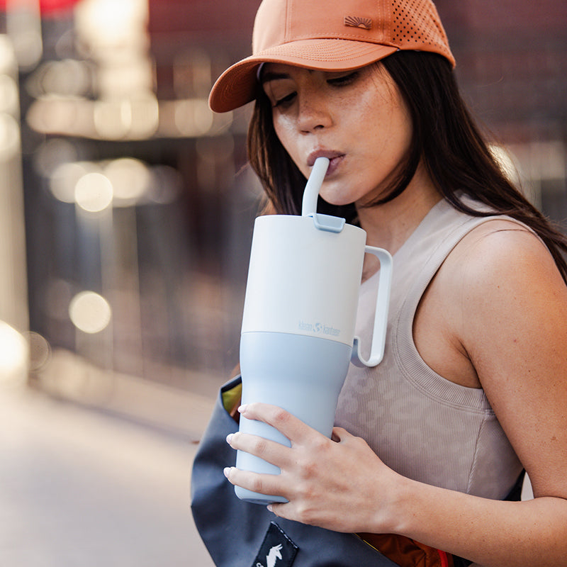 36oz-rise-tumbler-with-straw-lid-d3 36oz_rise_tumbler_straw_girl_sip_square.jpg