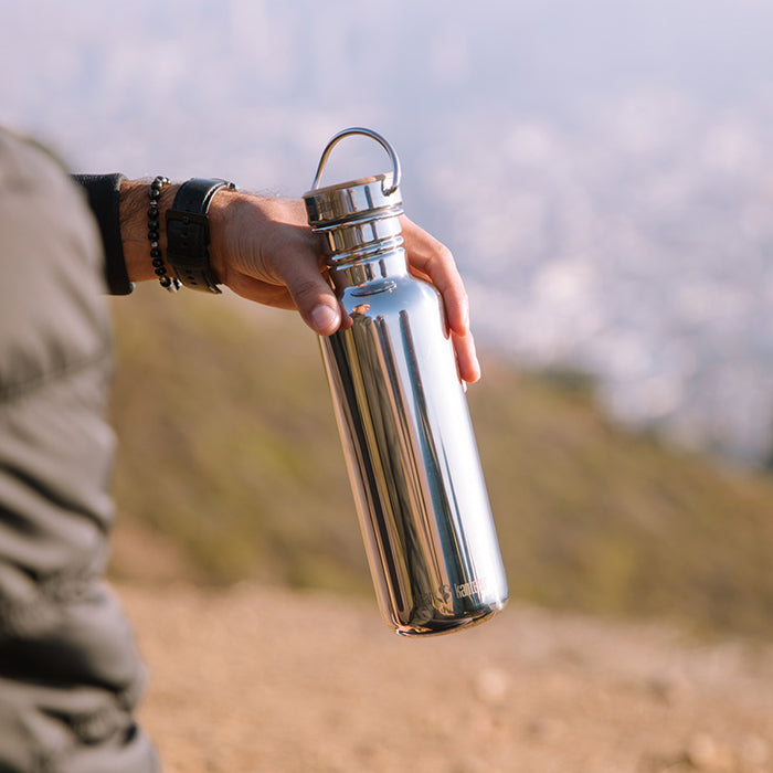 27oz-reflect-with-bamboo-cap-u3 K27SSLRF-MS-BAMBOO_reflect_bottle_hand_lifestyle.jpg