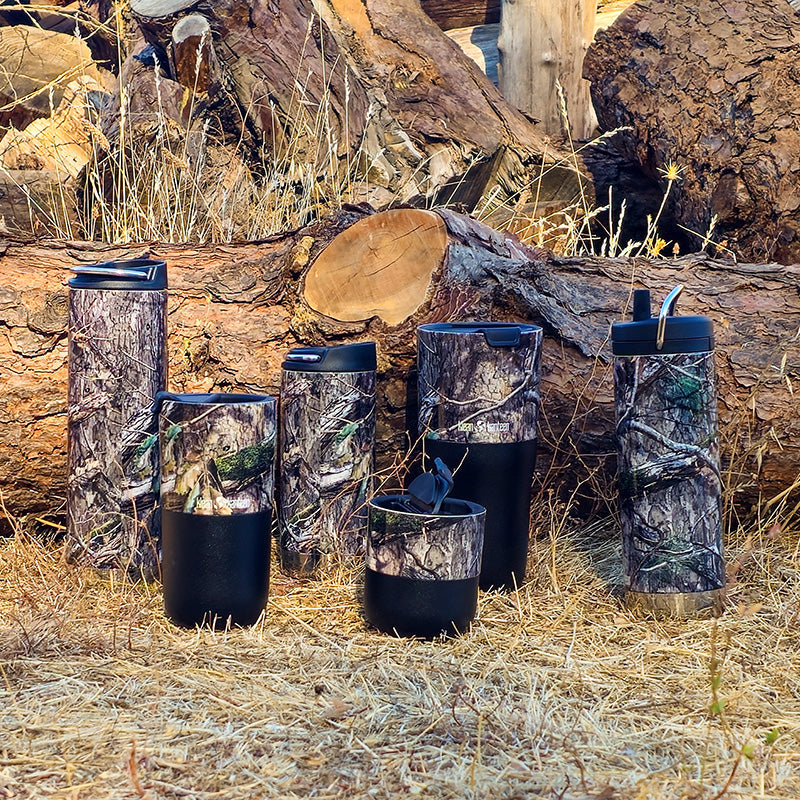12oz-tkwide-with-cafe-cap-mossy-oak-x1 MossyOak_CountryDNA_collection_grass_logs_square.jpg