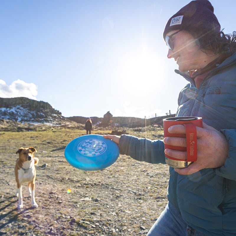 12oz-camp-mug-w7 insulated_camp_mug_12oz_woman_dog_frisbee_square.jpg