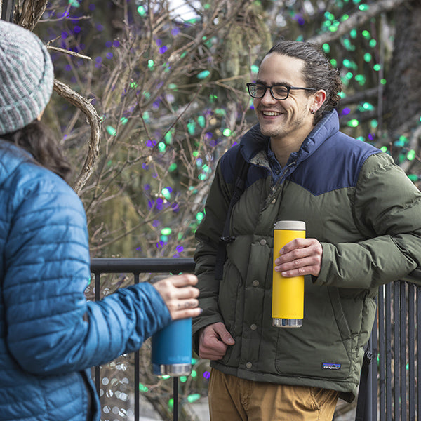20oz-tkwide-with-cafe-cap-p4 tkwide_20oz_insulated_tumbler_cafe_winter_man_coat_yellow_square.jpg